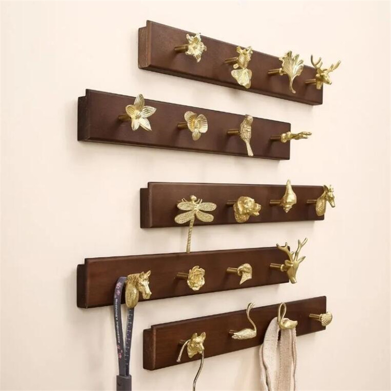 Wall Mount Row Hook Brass Anim - Antique Brass Hook recension och pris