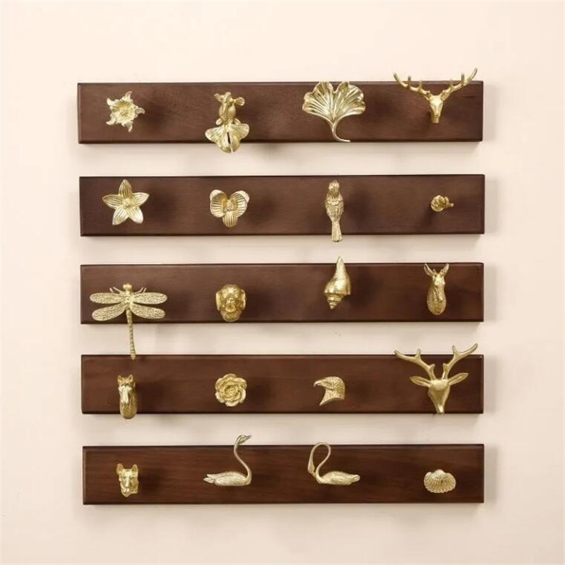 Wall Mount Row Hook Brass Anim - Antique Brass Hook recension och pris